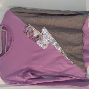 Purple and grayed long sleeve top for girls.